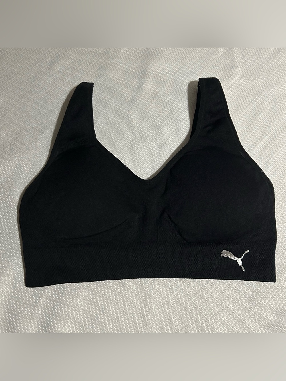 Puma Black Seamless V‑Neck Sports Bra with Logo